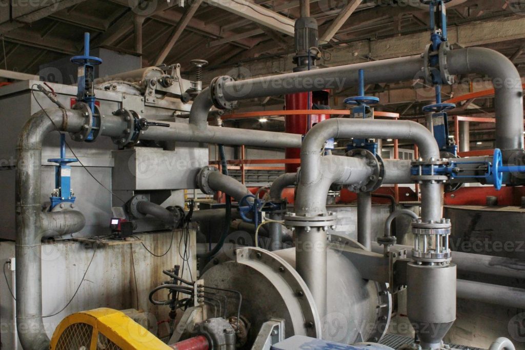 steel-pipes-tubes-steam-turbine-valves-machinery-cables-of-modern-factory-gas-boiler-room-industrial-zone-power-plant-pump-engineering-station-technical-equipment-system-energy-water-concept-photo steel-pipes-tubes-steam-turbine-valves-machinery-cables-of-modern-factory-gas-boiler-room-industrial-zone-power-plant-pump-engineering-station-technical-equipment-system-energy-water-concept-photo